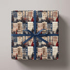 Vintage Christmas wrapping paper with winter city townhouses and blue ribbon by Wrapped Studios.