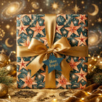 Starry celestial Christmas wrapping paper with a luxury gold bow by Wrapped Studios.
