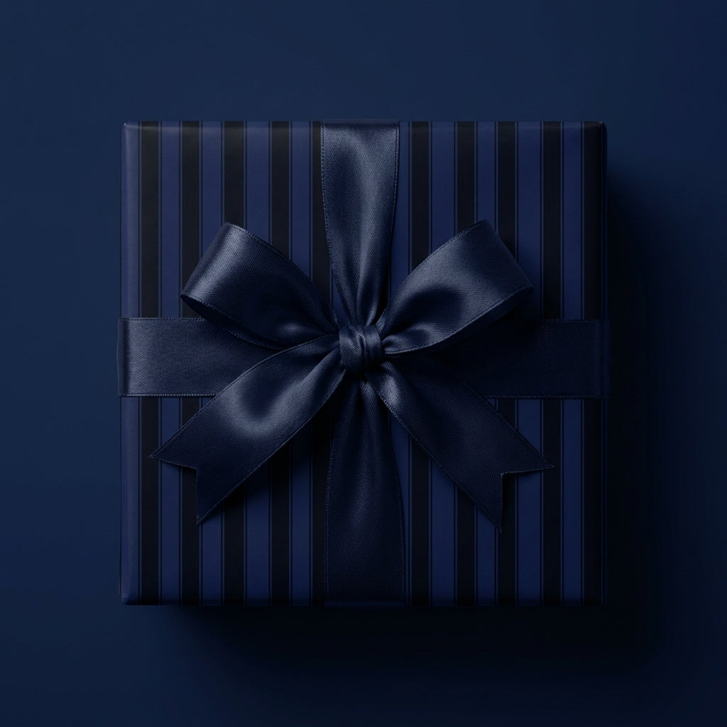 Navy striped luxury gift wrap on square present with satin bow.