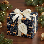 Elegant Christmas gift wrap with deer and floral pattern, tied with cream ribbon.