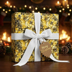 Gold floral wrapping paper on a Christmas gift with white ribbon bow.