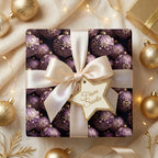 Elegant Christmas gift wrap with purple ornament pattern, ivory ribbon, and "From Santa" tag.