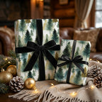 Elegant Christmas gift wrap with tree pattern and black velvet ribbon.