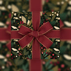 Elegant floral wrapping paper with a burgundy ribbon, perfect for Christmas gift wrap.