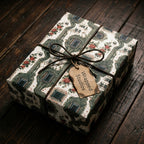 Vintage floral circuit board wrapping paper by Wrapped Studios on a gift box tied with rustic twine.