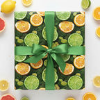 Citrus-themed wrapping paper with a green ribbon; perfect for a summer birthday gift.