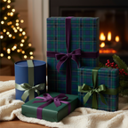 Elegant Christmas gift wrap with tartan plaid paper and velvet ribbons.