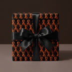 Luxury violin music wrapping paper with a black satin bow on a gift box by Wrapped Studios.