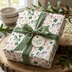 Horse and shamrock wrapping paper with sage green velvet bow by Wrapped Studios.