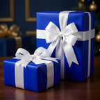 Royal blue wrapping paper on gifts tied with elegant white satin ribbon and bows for Christmas or birthday.