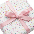 Colorful polka dot wrapping paper with a light pink satin bow, perfect for a fun birthday or baby shower gift.
