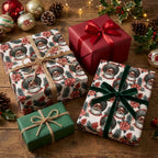 Black Santa Christmas gift wrap with green velvet and twine bows on rustic wood background by Wrapped Studios.