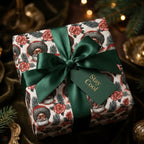 Retro Black Santa Christmas gift wrap with green satin bow and tag, by Wrapped Studios.