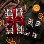 Retro Santa Christmas wrapping paper on holiday gifts with red and black bows by Wrapped Studios.