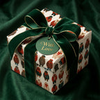 Luxury Christmas wrapping paper with cute winter bears and a green velvet bow, by Wrapped Studios.
