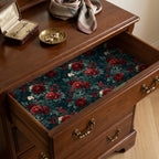 Vintage red rose floral wrapping paper lining a wooden dresser drawer, by Wrapped Studios.