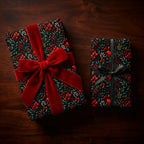 Elegant floral wrapping paper with red velvet ribbon on gift boxes from Wrapped Studios.