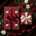Elegant floral gift wrap on presents with red and cream ribbons. Perfect Christmas gift wrap.