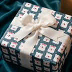Cute polar bear wrapping paper with a white ribbon for a kids birthday or baby shower, by Wrapped Studios.
