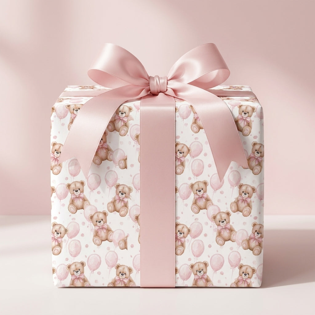 Pink teddy bear baby shower wrapping paper with a large satin bow by Wrapped Studios.
