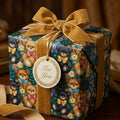 Vintage teddy bear baby shower wrapping paper by Wrapped Studios, tied with a luxury gold velvet bow.