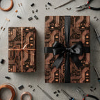 Tech circuit board wrapping paper in copper and black with a black ribbon by Wrapped Studios.