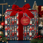 Cute dog Christmas wrapping paper with a red velvet bow and Santa Paws gift tag by Wrapped Studios.