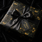 Wrapped gift with black Halloween gift wrap, black ribbon, and tag reading, "A Mystery Inside".