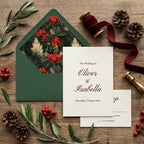Elegant Christmas wedding invitation with botanical berry envelope liner and velvet ribbon by Wrapped Studios.