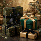 Elegant dark green botanical Christmas wrapping paper on luxury gift boxes by Wrapped Studios.