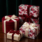 Vintage botanical floral wrapping paper on luxury holiday gift boxes by Wrapped Studios.