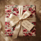 Vintage mushroom wrapping paper with a cream satin bow and gift tag by Wrapped Studios.
