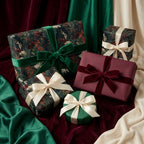 Moody floral wrapping paper and luxury holiday gift wrap with velvet ribbons by Wrapped Studios.