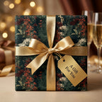 Luxury dark floral wrapping paper with gold ribbon by Wrapped Studios, perfect for elegant wedding or holiday gifts.