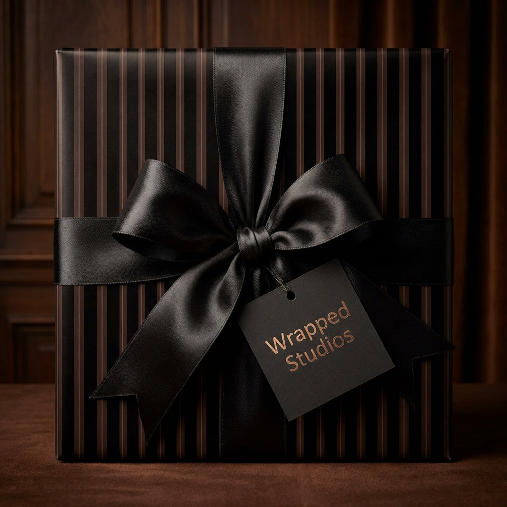 Elegant black and brown striped gift wrapped with satin ribbon and bow.