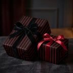Elegant gifts wrapped in striped burgundy wrapping paper with velvet bows.