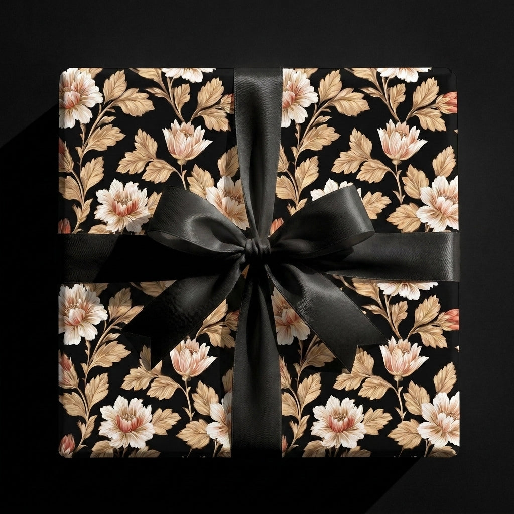 Luxury vintage floral wrapping paper with a black satin bow on a gift box by Wrapped Studios.
