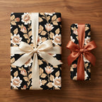 Luxury black vintage floral wrapping paper with cream and copper satin bows by Wrapped Studios.