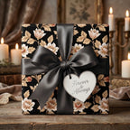 Luxury vintage floral wrapping paper with a charcoal satin bow and wedding gift tag by Wrapped Studios.