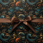 Dark fantasy wrapping paper with dragon and pangolin design, finished with a brown ribbon bow.