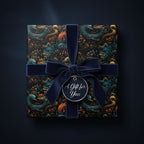 Square gift wrapped in monster pattern paper with a velvet ribbon and "A Gift for You" tag.