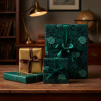 Elegant gifts wrapped in floral wrapping paper with satin bows, suitable for Christmas or birthday presents.