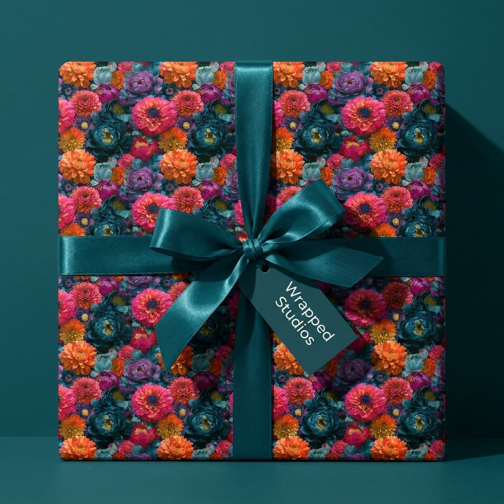 Luxury floral wrapping paper with teal, pink, and orange flowers and a satin bow, by Wrapped Studios.