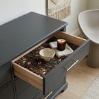 Moody dark floral wrapping paper used as a decorative drawer liner by Wrapped Studios.
