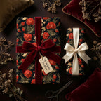Luxury vintage floral wrapping paper with red flowers and a velvet bow by Wrapped Studios.