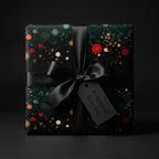 Elegant gift in Wrapped Studios dark floral wrapping paper with black satin ribbon.