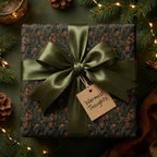 Luxury forest Christmas wrapping paper with olive green satin bow by Wrapped Studios.