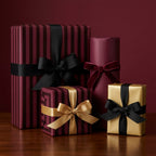 Luxury burgundy and gold Christmas wrapping paper with elegant striped patterns by Wrapped Studios.