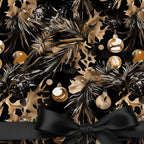 Elegant Christmas gift wrap with a black ribbon, featuring a gold ornament and leaf pattern on a black background.