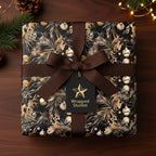 Elegant Christmas gift wrap with gold ornament and pine bough pattern, brown ribbon, and tag.